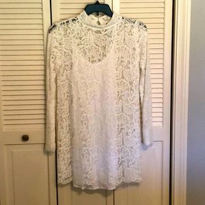 Beautiful white lace long sleeve mini dress